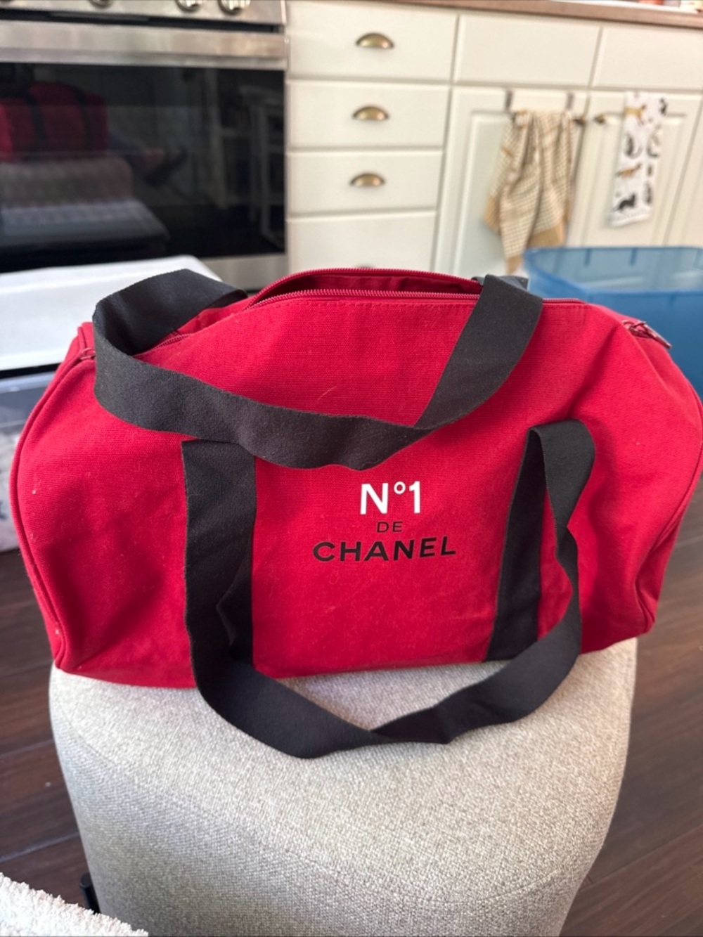 CHANEL Red Canvas Duffel with Black Straps